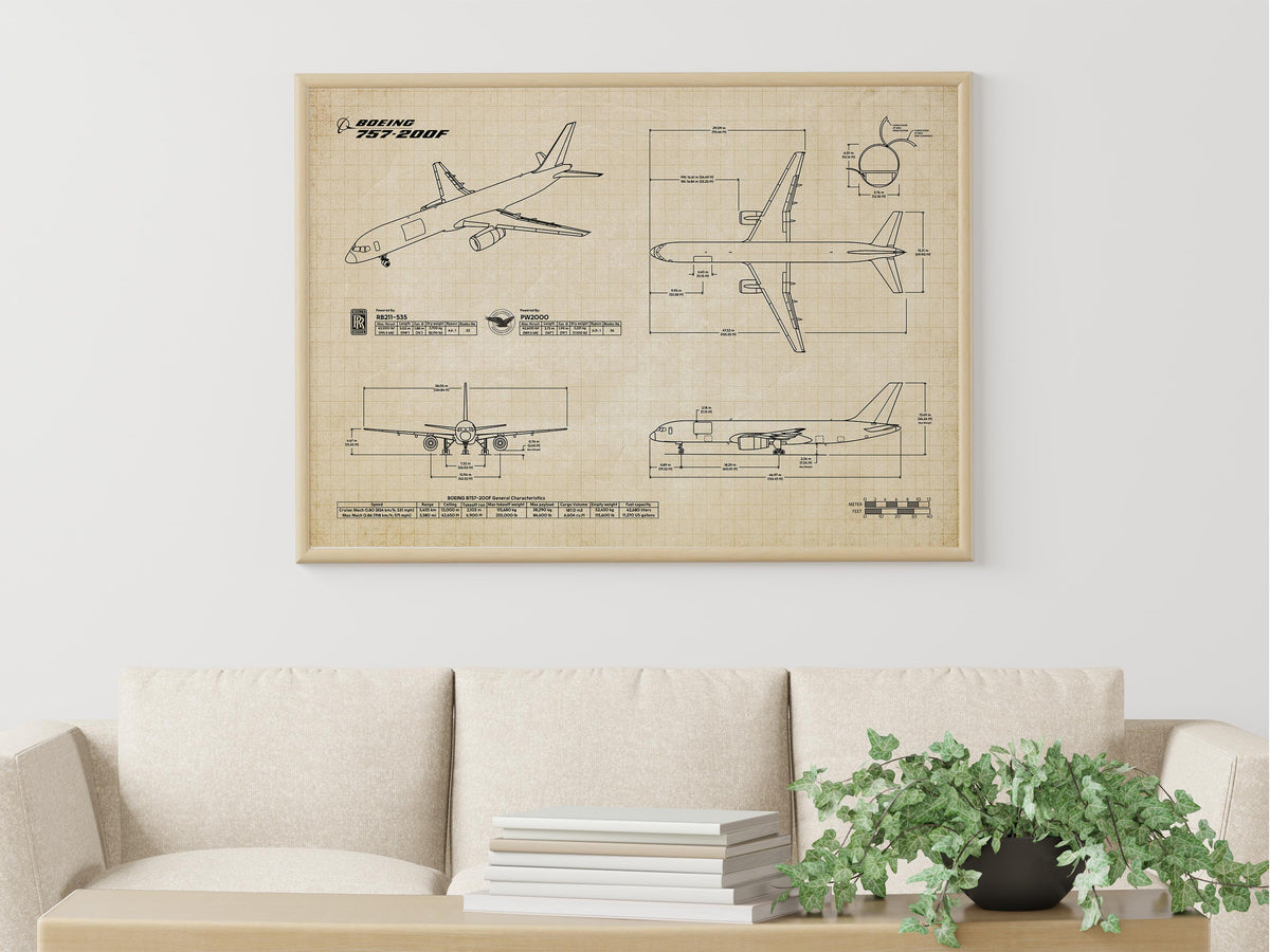 Boeing B757-200F Landscape Blueprint Poster print material framed and hung above a beige sofa with green plant
