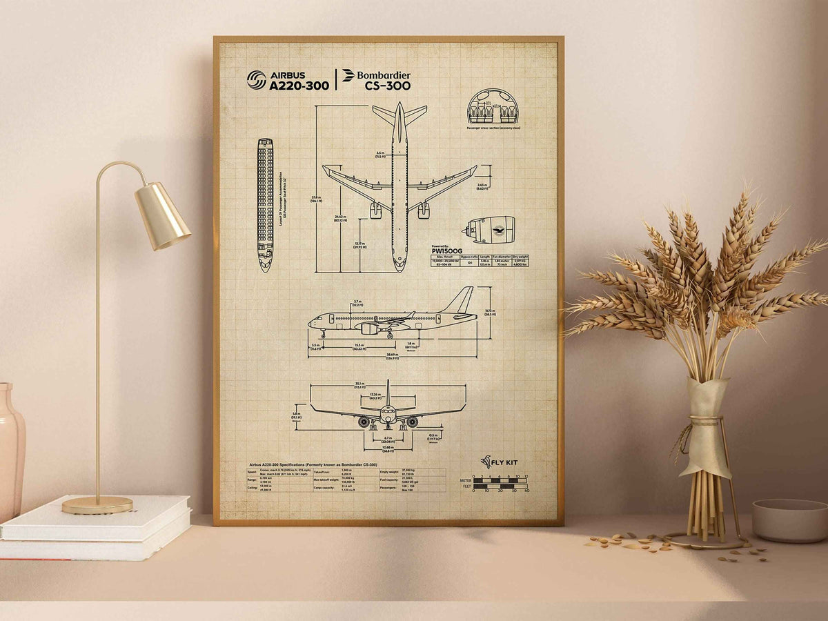 FlyKit Airbus A220-300 Portrait Blueprint Poster displayed on a desk with a lamp and dried flowers