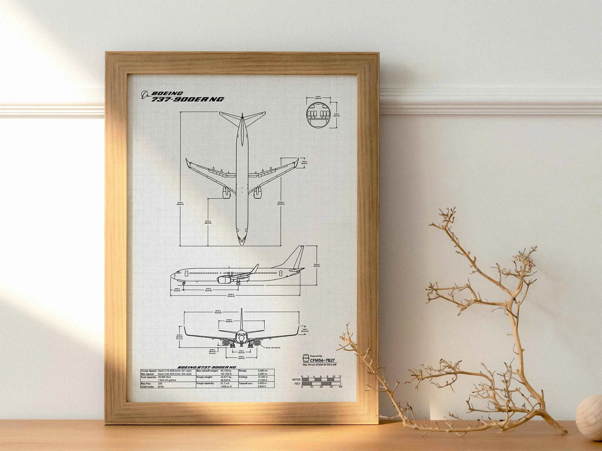 Boeing B737-900 Portrait Blueprint Poster by FlyKit displayed in a wooden frame on a minimal white wall