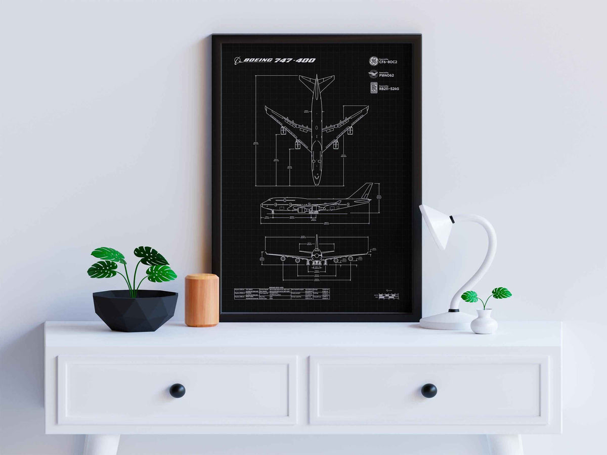 FlyKit Boeing B747-400 Portrait Blueprint Poster displayed on white table with plants and lamp