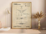 Boeing P-8 Poseidon Portrait Blueprint poster by FlyKit displayed on a desk with lamp and dried flowers