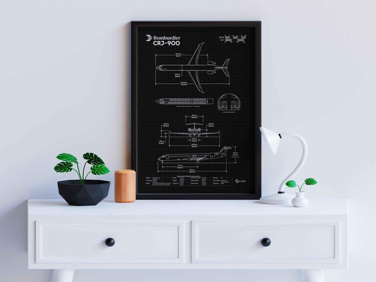 Bombardier CRJ-900 Portrait Blueprint Poster by FlyKit displayed on white table with decorative plants and lamp